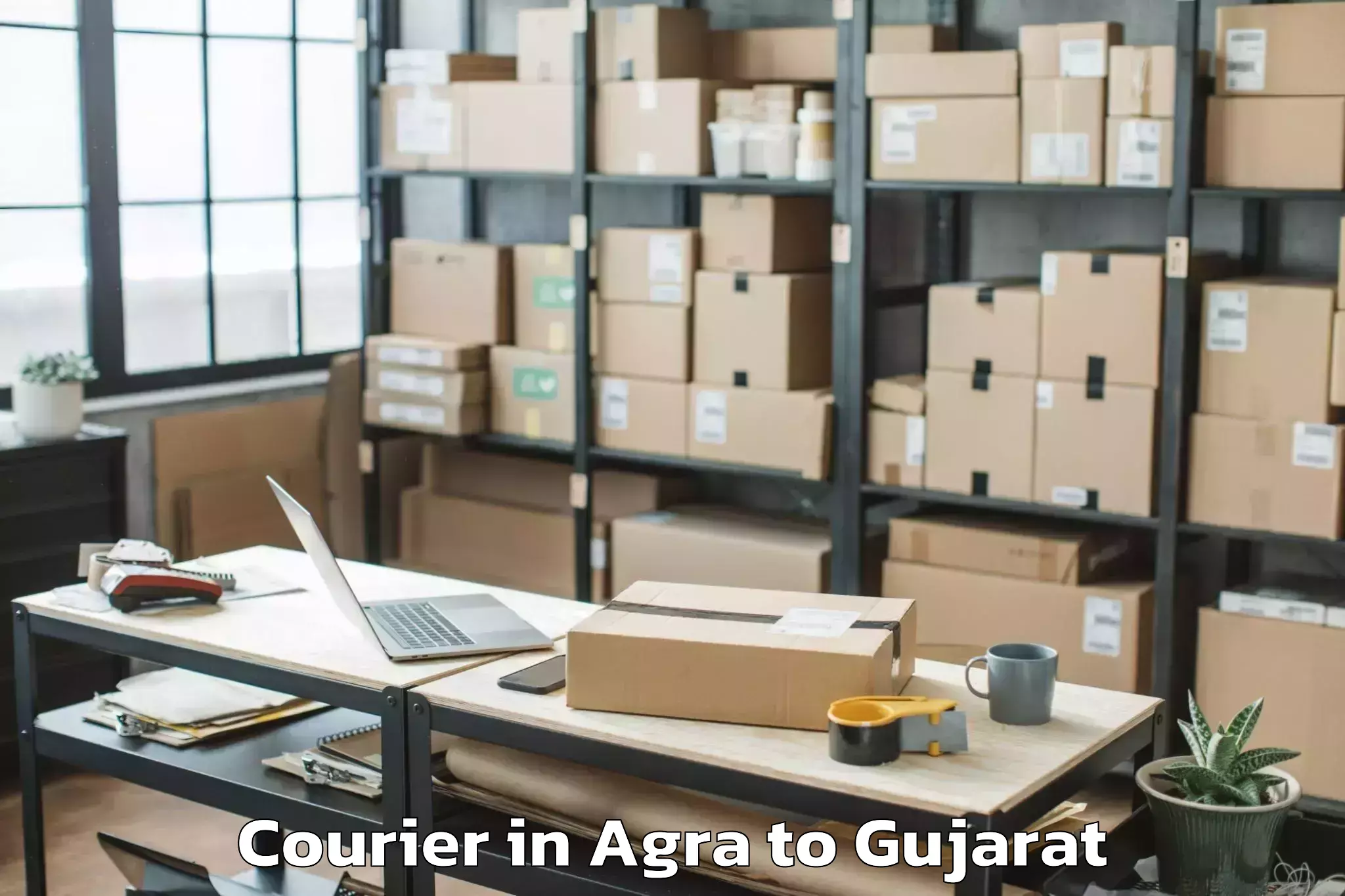 Top Agra to Gujarat Ayurved University Jam Courier Available